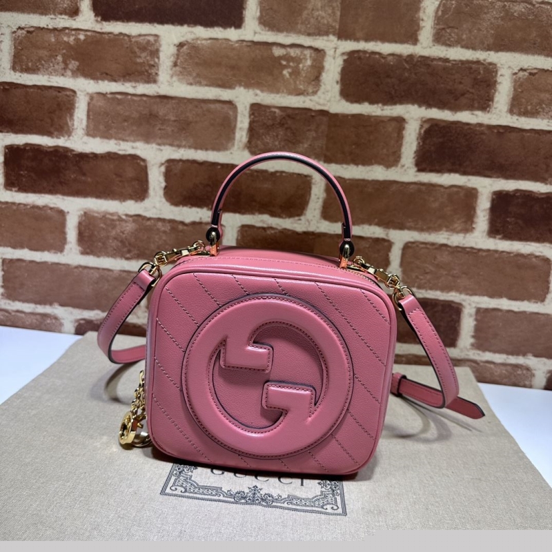 G*u*i top handle bags